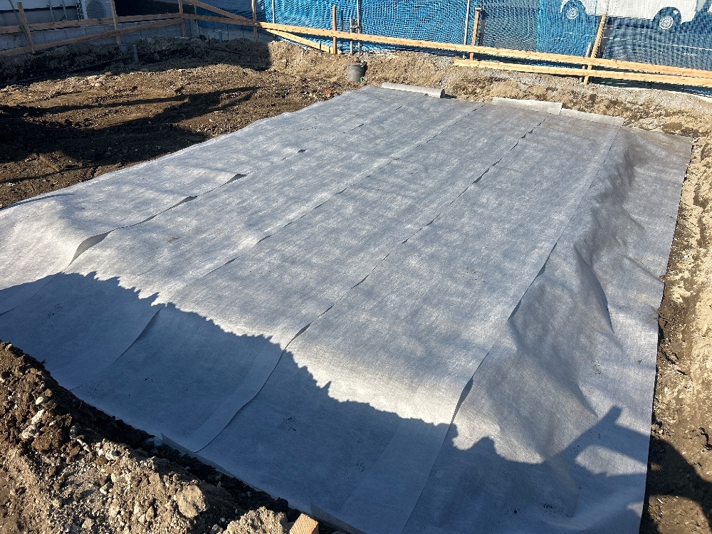 IH様邸　テクトンシート敷込・転圧